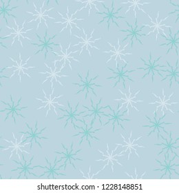Winter seamless pattern with chaotic snowflakes in different shades of blue color. Light Christmas repeat backdrop using for cards, wallpapers, scrapbooking, print, gift wrap, UFO camouflage etc.