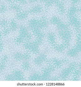Winter seamless pattern with chaotic snowflakes in different shades of blue color. Light Christmas repeat backdrop using for cards, wallpapers, scrapbooking, print, gift wrap, UFO camouflage etc.
