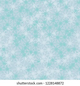 Winter seamless pattern with chaotic snowflakes in different shades of blue color. Light Christmas repeat backdrop using for cards, wallpapers, scrapbooking, print, gift wrap, UFO camouflage etc.