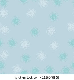 Winter seamless pattern with chaotic snowflakes in different shades of blue color. Light Christmas repeat backdrop using for cards, wallpapers, scrapbooking, print, gift wrap, UFO camouflage etc.