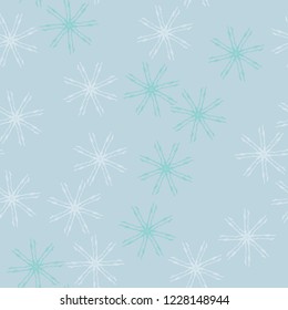 Winter seamless pattern with chaotic snowflakes in different shades of blue color. Light Christmas repeat backdrop using for cards, wallpapers, scrapbooking, print, gift wrap, UFO camouflage etc.