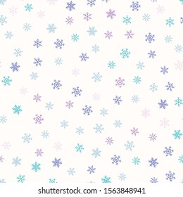 Winter seamless pattern. Christmas background with colored snowflakes scattered on white backdrop. Elegant vector texture. Festive winter holiday theme. Simple repeat design for decoration, wallpaper