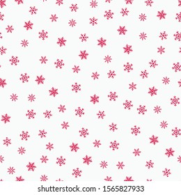 Winter seamless pattern. Christmas background with small red snowflakes scattered on white backdrop. Elegant vector texture. Festive winter holiday theme. Simple repeat design for decor, gift paper