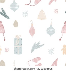 Winter seamless pattern with Christmas decorations, snowflake, knitted hat and mittens, gift box, fir branch, cone, bell on white background for child fabric, textile, nursery, wallpaper