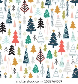 Winter seamless pattern with christmas trees, spruce woods on white background. Surface design for textile, fabric, wallpaper, wrapping, giftwrap, paper, scrapbook and packaging.