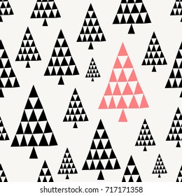 Winter seamless pattern with Christmas trees in red and black on white background.