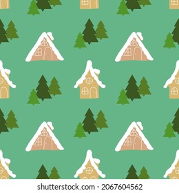Winter seamless pattern with fir-trees and houses on the green background. Christmas vector illustration.