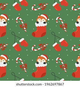 Winter seamless pattern with fox,   caramel and mittens. Perfect for wrapping paper,  greeting cards and seasonal design.