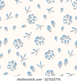 Winter seamless pattern with paw prints of birds, hare and dog on the snow