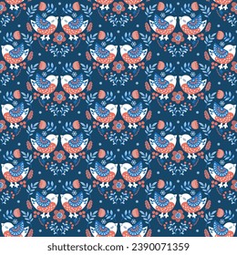 Patrón de invierno sin fisuras. Siluetas de besos decorativos, ornamentales de pájaros de nieve entre las ramas y flores sobre un fondo azul oscuro