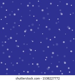 Winter seamless pattern from smowflakes in blue tones