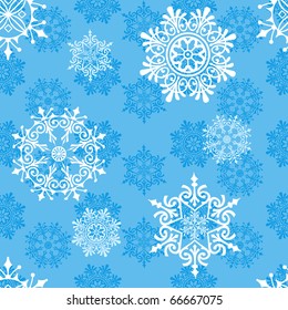 Winter seamless pattern with snowflakes in blue color