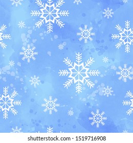 Winter seamless pattern with snowflakes on a blue watercolor background.