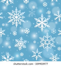 Winter seamless pattern with snowflakes on blue background