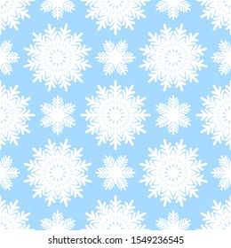 Winter seamless pattern with white snowflakes on blue background. Vector illustration for fabric, textile wallpaper, posters, gift wrapping paper. Christmas vector illustration. 