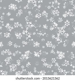 Winter seamless pattern with white snowflakes on grey background. Vector illustration for fabric, textile wallpaper, posters, gift wrapping paper. Christmas vector illustration. Falling snow.