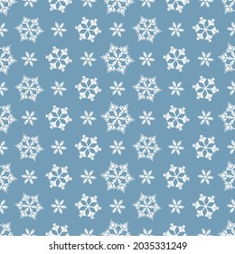 Winter seamless pattern with white snowflakes on grey background. Vector illustration for fabric, textile wallpaper, posters, gift wrapping paper. Christmas vector illustration. Falling snow.