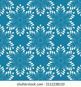 Winter seamless pattern with white snowflakes on blue background. Vector illustration for fabric, textile wallpaper, posters, gift wrapping paper. Christmas vector illustration. Falling snow.