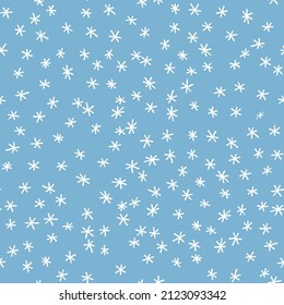 Winter seamless pattern with white snowflakes on blue background. Vector illustration for fabric, textile wallpaper, posters, gift wrapping paper. Christmas vector illustration.