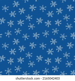 Winter seamless pattern with white snowflakes on blue background. Vector illustration for fabric, textile wallpaper, posters, gift wrapping paper. Christmas vector illustration. Falling snow.