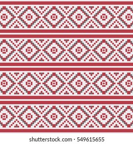 Winter seamless pixel pattern. Pastiche Scandinavian embroidery ornament. Knitted Christmas ornament.