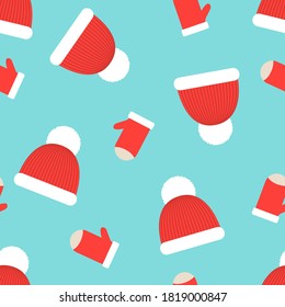 Winter seamless print for wrapping paper, web page etc. Vector illustration with red-white hats and mittens on light blue backdrop