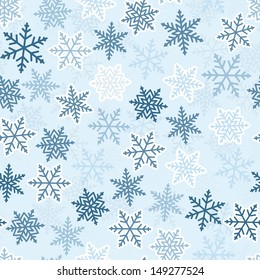 Winter seamless texture with ornamental snowflakes. For design Christmas greeting cards, backgrounds, textile, package, wrapping paper