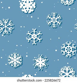 Winter seamless texture with snowflakes