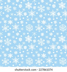 Winter seamless texture with snowflakes