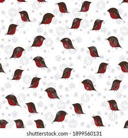 Winter season vector seamless pattern composed of bullfinches and snawflakes chaotic version