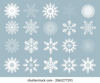 Conjunto invernal de copos de nieve blancos aislados en un fondo claro. Iconos de copos de nieve. Colección de copos de nieve para el diseño de pancartas y tarjetas de Navidad y Año Nuevo.