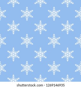 Winter snowflake pattern. Blue background. Vector illustration.