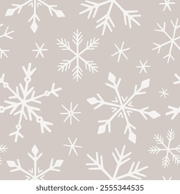 Winter Snowflakes Seamless Pattern. Christmas hand drawn white snow print on beige background. New year texture for print, wrapping paper, design, fabric, decor, gift backgrounds, wallpaper