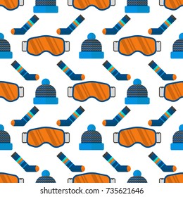 Winter sport seamless pattern. Skiing and snowboarding set equipment isolated on white background in flat style design for decorative wallpaper, printing, backdrop, scrapbook.