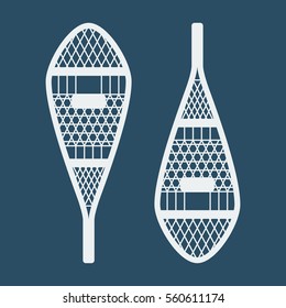 winter sports and outdoor activities equipment: pair of indian traditional snowshoes isolated on a blue background. vector eps-10