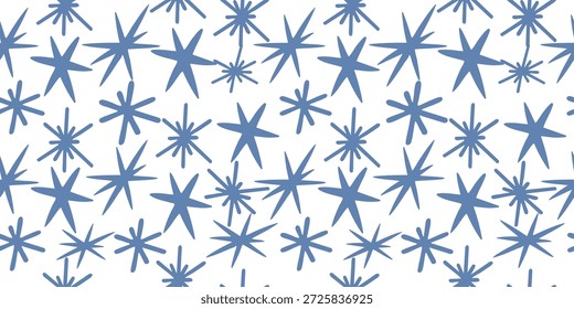 Winter starburst snowflake seamless pattern in blue tones