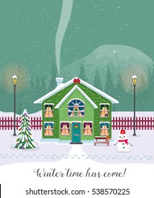 Winter time has come. Postcard with pretty houses in the snow. Decorated Christmas elements.