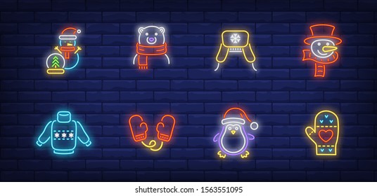 Winter time neon sign set. Snowman, mitten warm hat, sweater, penguin. Vector illustration in neon style, bright banner for topics like December holidays, vacation, Christmas