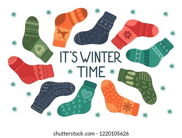 It's winter time. Warm socks with hand written text. Vector illustration.