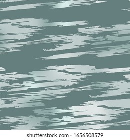 Winter urban camouflage of various shades of grey and white colors. It is a colorful seamless pattern that can be used as a camo print for clothing and background and backdrop or computer wallpaper