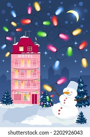 Winter urban landscape with a hotel building, a snowman, fir trees and a multi-colored garland against the background of the night starry sky