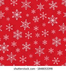 Winter vector illustration of snowflakes in the form of a seamless pattern, designed for cards, notebooks, fabrics and textiles in honor of the new year