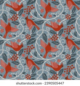 Winter vector seamless pattern with Northern cardinal birds, leaves and branches. Red birds on blue background. Christmas surface pattern design with flying forest birds for fabrics, wallpaper