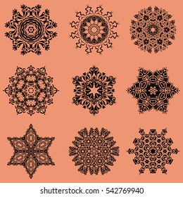 Winter vector sketch with arabesques, doodles and snowflakes. Fine greeting card. Colorful snowflakes set on a orange background.