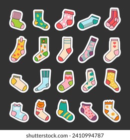 Winter warm socks. Sticker Bookmark. Stylish cotton and woolen with different textures. Hand drawn style. Vector drawing. Collection of design elements.