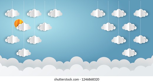 Winter weather and paper clouds. blue background.