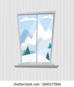 Winter window. View from the window to the mountains