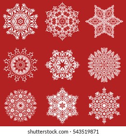 Winter windstorm background. Blow snow texture on a red background. Set of 9 abstract snowflakes. Winter mood background. Winter weather. Abstract snowstorm with stylized snowflakes.