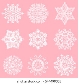 Winter windstorm background. Set of 9 abstract snowflakes. Winter mood background. Winter weather. Abstract snowstorm with stylized snowflakes. Blow snow texture on a neutral background.