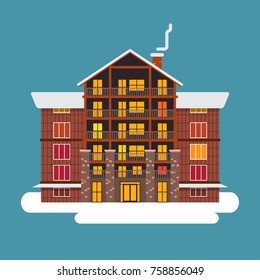Winter wodden, brick, big house or hotel. With snow roof. Isolated on blue background